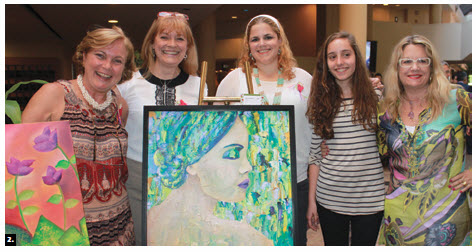 Silvia Bompadre, second from left and wife of Argentina’s minister, presented an art show of her work and the work of her students. From left, Bibiana Piza, wife of the Costa Rican ambassador, Ms Bompadre, Lidia Nunez, wife of the ambassador of Paraguay, Maria Leonor Sabido Costa (Portugal), and Silvia Genereux. (Photo: Ulle Baum) 