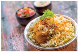 Biryani is a combination of spiced rice, usually cooked with meat or chicken and often vegetables as well. 