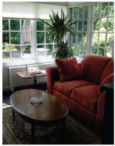 The sunroom, a later addition, offers an amazing view of the grounds, which overlook the Ottawa River. 