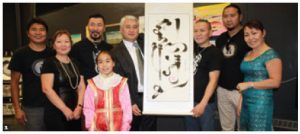 The Embassy of Mongolia hosted a vernissage for an exhibition of Mongolian Art at Ottawa Arts Court. Ambassador Altangerel Radnaabazar (centre) is shown with the group of artists. (Photo: Ulle Baum)