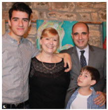 Silvia Bompadre, wife of the Argentine embassy’s minister, participated in an art exhibition at St. Brigid's Centre for the Arts. She is shown with her husband, and two sons, Nicolas (left) and Santiago (front). (Photo: Ulle Baum)