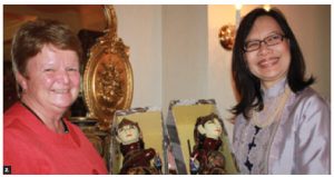 Fisheries Minister Gail Shea, left, was a keynote speaker at a Women Ambassador's (WAO) luncheon hosted by Indonesian Ambassador Dienne Moehario, right, at her residence. Ms Shea is shown receiving a gift of Indonesian dolls. (Photo: Ulle Baum)