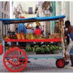 Cuba is home to many varieties of tropical fruit, often sold by vendors such as these, in the streets of Havana.