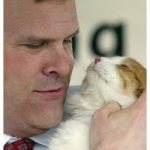 With his beloved late cat, Thatcher.