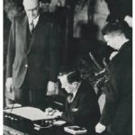 Then-external affairs minister Lester B. Pearson signs the NATO treaty for Canada.