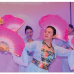 To mark International Women's Day, the Chinese embassy hosted an event featuring cultural performances presented by female diplomats as well as musicians, singers and dancers. Jiang Yili, wife of the Chinese ambassador, centre, leads the one of the dances. (Photo: Ülle Baum)