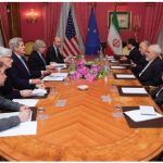 U.S. Secretary of State John Kerry, with State Department officials and others, sits across from Iranian Foreign Minister Mohammad Javad Zarif and advisers in Lausanne, Switzerland, before resuming negotiations about the future of Iran's nuclear program. (Photo: State Department)