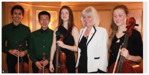 Norwegian Ambassador Mona Elizabeth Brother hosted a concert and dinner for Friends of the NAC Orchestra's Music to Dine For event at her residence. From left: Emerald String Quartet musicians Ethan Balakrishnan (viola), Jerry Wang (violin), Alisa Klebanov (violin), Ambassador Brother and Emma Grant-Zypchen (cello). (Photo: Ulle Baum) 