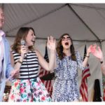 U.S. Ambassador Heyman, left, and his wife, Vicki, right, hosted a 4th of July party at Lornado, the name of the ambassador's residence. With their daughters Caroline, left, and Liza, they joined the band on stage. (Photo: Ulle Baum)