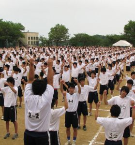 The Japanese government tracks levels of physical activity among its citizens. These students are taking part in a morning exercise routine at their high school in Kobe. 