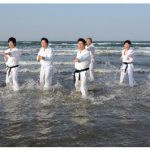 Karate training at the beach in Ehime, Japan.