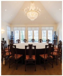 The dining room features a round table with 16 chairs. It can easily be converted to a banquet hall for sizable buffet dinners. (Photo: Dyanne Wilson)
