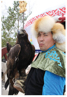 A Kazakh native holds his eagle at Zheruik, an ethno-village. (Photo: Ülle Baum)