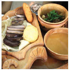 Horse meat and mutton are the basis for most of Kazakhstan’s national dishes. They are served here with baursaki bread (puffy fried dough) and shorpa (a white meat broth). (Photo: Ülle Baum)
