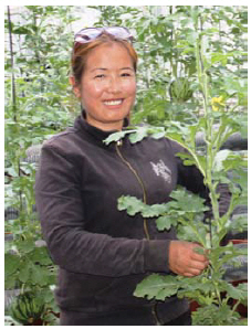 A woman grows watermelons in a Gobi desert greenhouse. (Photo: Ülle Baum)