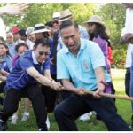The High Commission of Malaysia hosted the 2016 ASEAN picnic at Vincent Massey Park. Heads of mission, staff and their families took part. Here, Thai Ambassador Vijavat Isarabhakdi leads his team in a tug-of-war. (Photo: Sam Garcia)