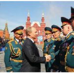 Russian President Vladimir Putin, shown here greeting members of his military, has established an ”authoritarian, expansionist state.” (Photo: presidential press and information office of russia)
