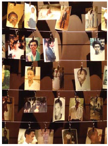 Photographs of genocide survivors hang in the Rwandan memorial centre. (Photo:  Adam Jones)