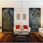 Art in the spacious living room includes two large paintings by the late acclaimed Pakistani artist Sadequain. Between the two paintings hang framed samples of calligraphy. (Photo: Ashley Fraser)