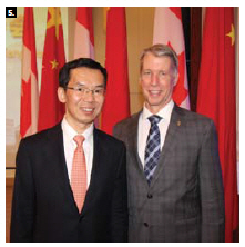 The Chinese embassy hosted a welcoming reception in honour of newly arrived Chinese Ambassador Lu Shaye. From left, the ambassador stands with MP Andrew Leslie, parliamentary secretary to the foreign minister. (Photo: Ülle Baum)