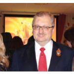 Tamilya Akhmetzhanova, left, Russian Ambassador Alexander Darchiev and Elizabeth Aubin, right, chargé d'affaires at the U.S. embassy, took part in Victory Day celebrations.