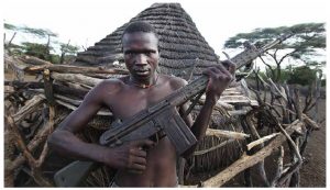 Civil war will continue to rage in South Sudan, from which this warrior hails, as well as the Central African Republic, Democratic Republic of Congo and Libya. South Sudan is only a seven-year-old republic and has been consumed by conflict between its politicians about oil revenues. (Photo: Steve Evans)