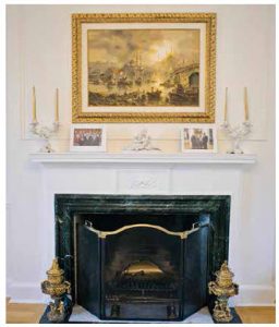 The home features many fireplaces, including this one, which is located in one of several sitting areas. (Photo: Ashley Fraser)