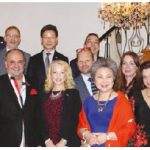 South Korean Ambassador Shin Maeng-ho is happy to share his culture's cuisine for a good cause. He's shown here (fourth from the left, second row) with guests at a dinner in support of the University of Ottawa's Brain and Mind Research Institute. (Photo: Embassy of Korea)