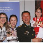 The Ottawa Service Attachés Association organized an international cuisine night at Sala San Marco Conference Centre. From left, Alina Ureche (Romania), Yu Wang (China), her husband, Chinese defence attaché Senior Col. Zhu Haitao and Romanian defence attaché Florin Ureche. Alina and Florin Ureche’s two daughters, Ruxandra and Ecaterina, are wearing traditional Romanian costumes. (Photo: Ülle Baum)