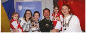 The Ottawa Service Attachés Association organized an international cuisine night at Sala San Marco Conference Centre. From left, Alina Ureche (Romania), Yu Wang (China), her husband, Chinese defence attaché Senior Col. Zhu Haitao and Romanian defence attaché Florin Ureche. Alina and Florin Ureche’s two daughters, Ruxandra and Ecaterina, are wearing traditional Romanian costumes. (Photo: Ülle Baum)