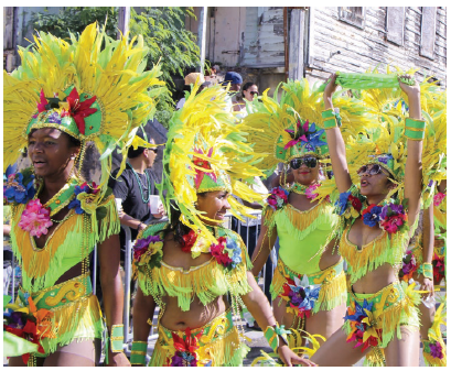 Migration — voluntary or otherwise — has and continues to shape the Caribbean. Festivals such as this one celebrate the region’s diversity. (Photo: © Linda Morland } Dreamstime.com)