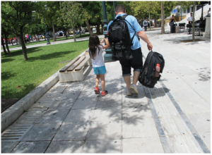 A prominent Turkish scientist who fled his native country is leaving Athens with his seven-year-old daughter, in hopes of being allowed to fly to Milan from which he'll eventually catch up with his wife and their 14-year-old daughter. He's carrying all of his worldly possessions in two backpacks. On this, their fifth attempt, they got lucky and eventually joined his wife and older daughter in Munich. (Photo: Jennifer Campbell)