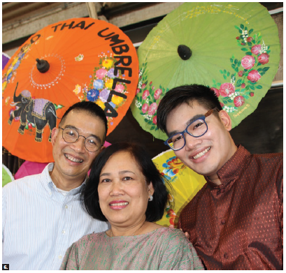 The Amazing Thailand Festival, held at the Horticulture Building of Lansdowne Park, featured cultural shows, handicrafts and food. From left: Thai Ambassador Maris Sangiampongsa, his wife, Kokan, and son, Chain, with colourful Thai umbrellas. (Photo: Ülle Baum)