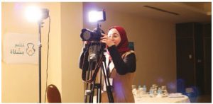 Anwar al Shwabkeh, an artist in residence with the PeaceGeeks Meshkat Community project, works on her film in Jordan.  (Photo: peacegeeks)