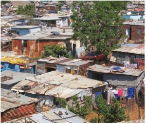 The most unequal country in the world — South Africa — is its continent's most industrialized and the sole African member of the G20. Shown here is a shanty town in Soweto. (Photo: Matt-80)