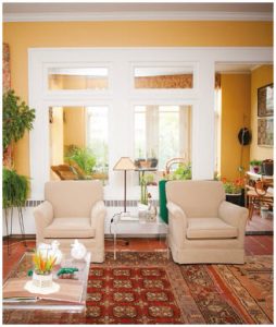 This reception room opens into a small sunroom full of light. (Photo: Ashley Fraser)