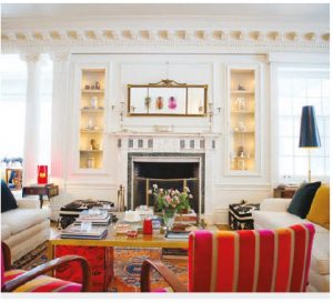 As its central element, the drawing room features a Carrara marble fireplace, ornate cornices and pops of colour in the furniture.  (Photo: Ashley Fraser)