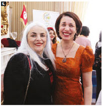 Tunisian Ambassador Mohamed Imed Torjemane and his wife, Ihssane Boujendar, hosted an event at their residence highlighting Tunisian cuisine. Boujendar is shown here, right, with Elbia Meghar, wife of the Algerian ambassador. (Photo: Sam Garcia) 