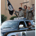 ISIS fighters entering Raqqa, Syria, in 2014. (Photo: Denarivs)