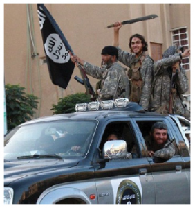 ISIS fighters entering Raqqa, Syria, in 2014. (Photo: Denarivs)