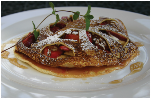 Summertime, and the entertaining is easy 1 Fruit-filled crêpes make a nice dessert or a fancy breakfast for special guests. (Photo: Larry Dickenson)
