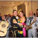 The Ottawa Service Attachés Association hosted annual international cuisine night at the Sala San Marco Conference Centre. More than 600 people attended the event and 18 countries participated. At centre, Lt.-Col. Pedro J. Ornelas Cruz, defence attaché of Mexico, and his wife, Natalia, dance to the music of a mariachi band. (Photo: Ülle Baum)