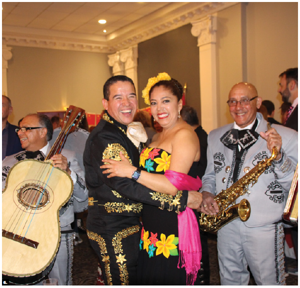 The Ottawa Service Attachés Association hosted annual international cuisine night at the Sala San Marco Conference Centre. More than 600 people attended the event and 18 countries participated. At centre, Lt.-Col. Pedro J. Ornelas Cruz, defence attaché of Mexico, and his wife, Natalia, dance to the music of a mariachi band. (Photo: Ülle Baum)