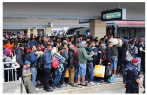 The migration crisis in Europe is about a lack of function in border control and the fact that those in the EU don't agree on joint principles of what migration and refugee status are. Shown here are Iraqi and Syrian migrants at the Vienna railway station in 2015. (Photo: Bwag)