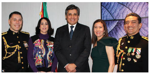 On the occasion of the 105th anniversary of the Mexican air force and the 107th anniversary of the Mexican army’s military representation in Canada, officials hosted a reception at the Hilton Garden Inn. From left: Col. Jose Antonio Gomez, Mexican military and air attaché; his wife, Erika; Mexican Ambassador Juan Jose Gomez Camacho; Roxana Reyes and her husband, Col. Roberto Carlos Sanchez, Mexican deputy military and air attaché. (Photo: Ülle Baum) 