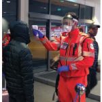Public health officials administer temperature checks at an airport in Bologna, Italy. (Photo: Dipartimento Protezione Civile from Italia)