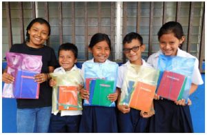 Students at SchoolBOX partner schools receive school supplies every year. These packages are important — they can mean the difference between going to school and dropping out. (Photo: courtesy of schoolbox)