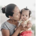 This mother and child in the Philippines benefit from Nutrition International’s programs. (Photo: nutrition international)