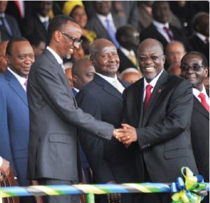 The late autocratic Tanzanian president John Magufuli, shown centre right with Rwandan President Paul Kagame, died of COVID in March. From April 2020, he refused to acknowledge probable coronavirus cases and likely deaths and allowed no testing for the virus. (Photo: Paul kagame photos, flickr)