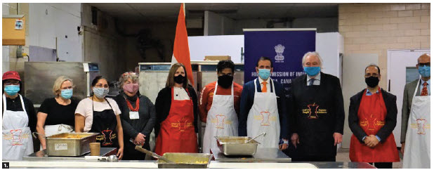 On India’s 72nd Republic Day, members of the high commission joined forces with Thali and Coconut Lagoon chef Joe Thottungal and Sylvain de Margerie, of Food for Thought, in the kitchens of the Château Laurier to prepare free hot meals for residents in Ottawa shelters. From left, Marie Thérèze Wang, Food for Thought financial officer; Kathleen Brault, Food for Thought inventory manager; Anupama Potdar, Food for Thought operations manager; Liz Smith, publicity co-ordinator; Deirdre Freiheit, president and CEO of Shepherds of Good Hope; Chef Joe Thottungal, Indian High Commissioner Ajay Bisaria, Sylvain de Margerie, Food for Thought founder and president; Sunil Kumar Sharma, second secretary at the Indian High Commission; and Prabhat Jain, first secretary. (Photo: Christo Raju) 